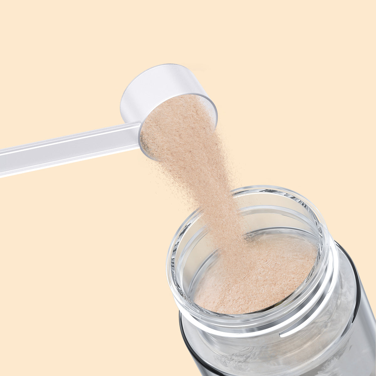 Qallo Energy Tropical Fruits tub: scoop of powder poured into a bottle