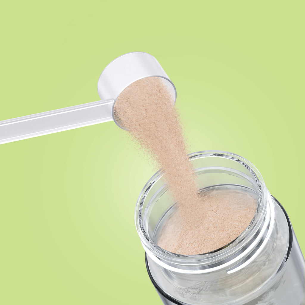 Qallo Energy Watermelon tub: scoop of powder poured into a bottle