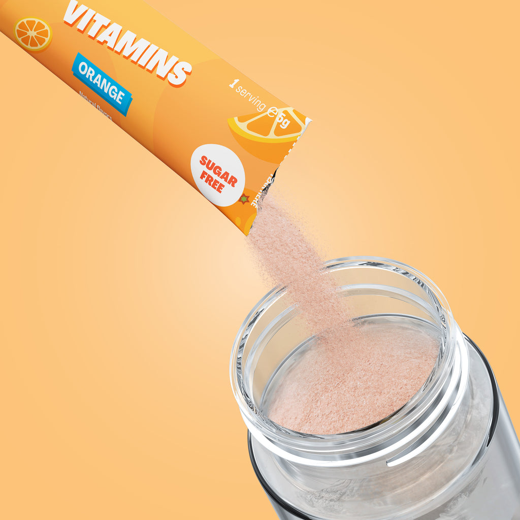 Qallo Vitamins Orange sachets: sachet poured into a bottle
