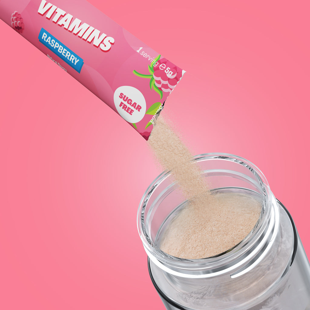 Qallo Vitamins Raspberry sachets: sachet poured into a bottle